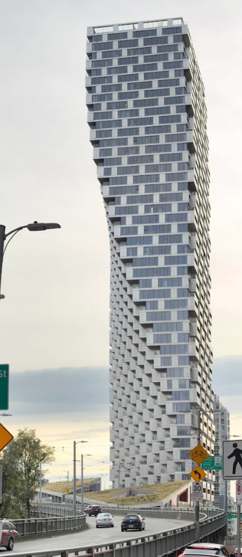 The Vancouver House tower seen from the bridge approach
